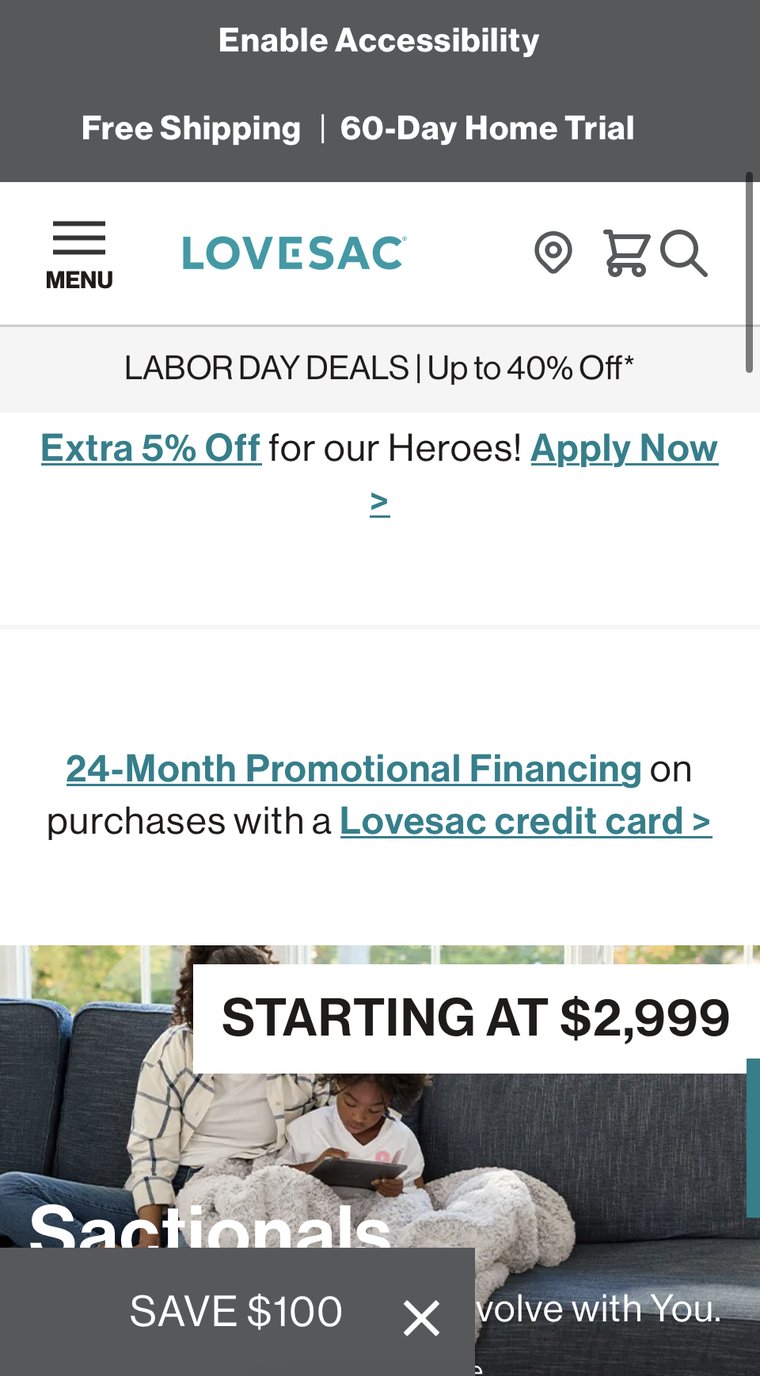 Lovesac.com mobile homepage with the 24-month financing offer as a plain underlined text link, stacked between an Extra 5% Off heroes-discount link and a Labor Day sale banner.