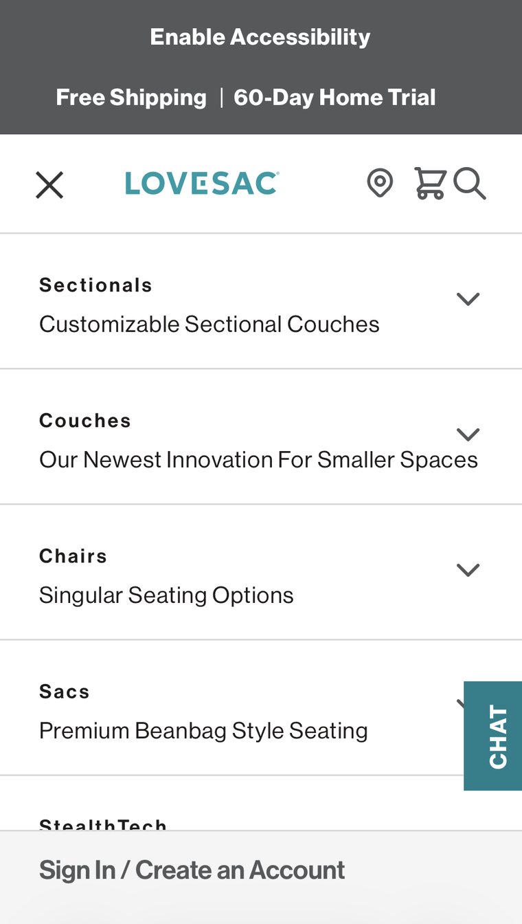 Original Lovesac mobile menu: a flat list of product categories, each with a description and chevron, and a floating chat tab overlapping the content.