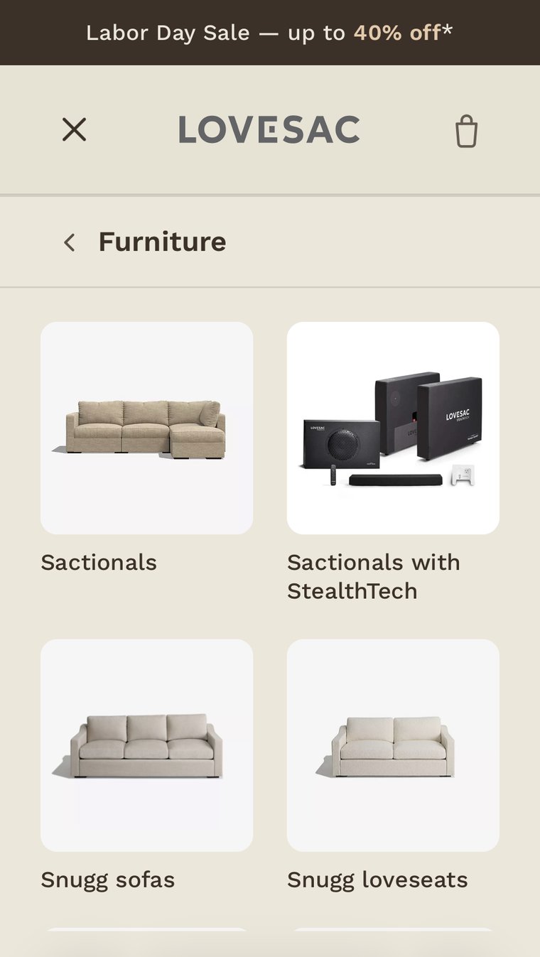 Redesigned Lovesac mobile menu on the Furniture screen, showing a photo grid of subcategories: Sactionals, Sactionals with StealthTech, Snugg sofas, and Snugg loveseats.